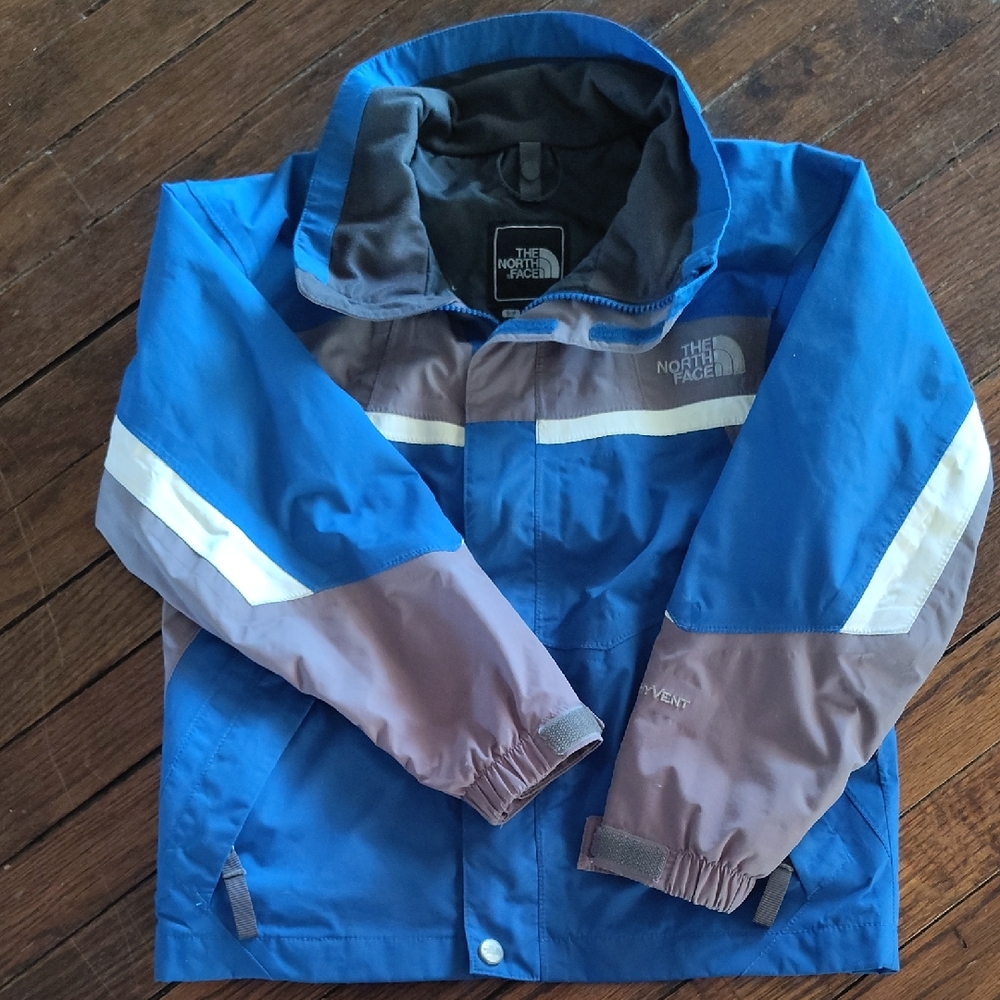 The North Face Blue and Gray Kids' Waterproof Jacket with White Accents